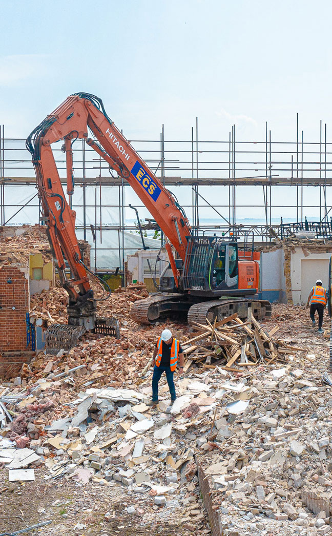Plant equipment providing demolition contractor services on a local project